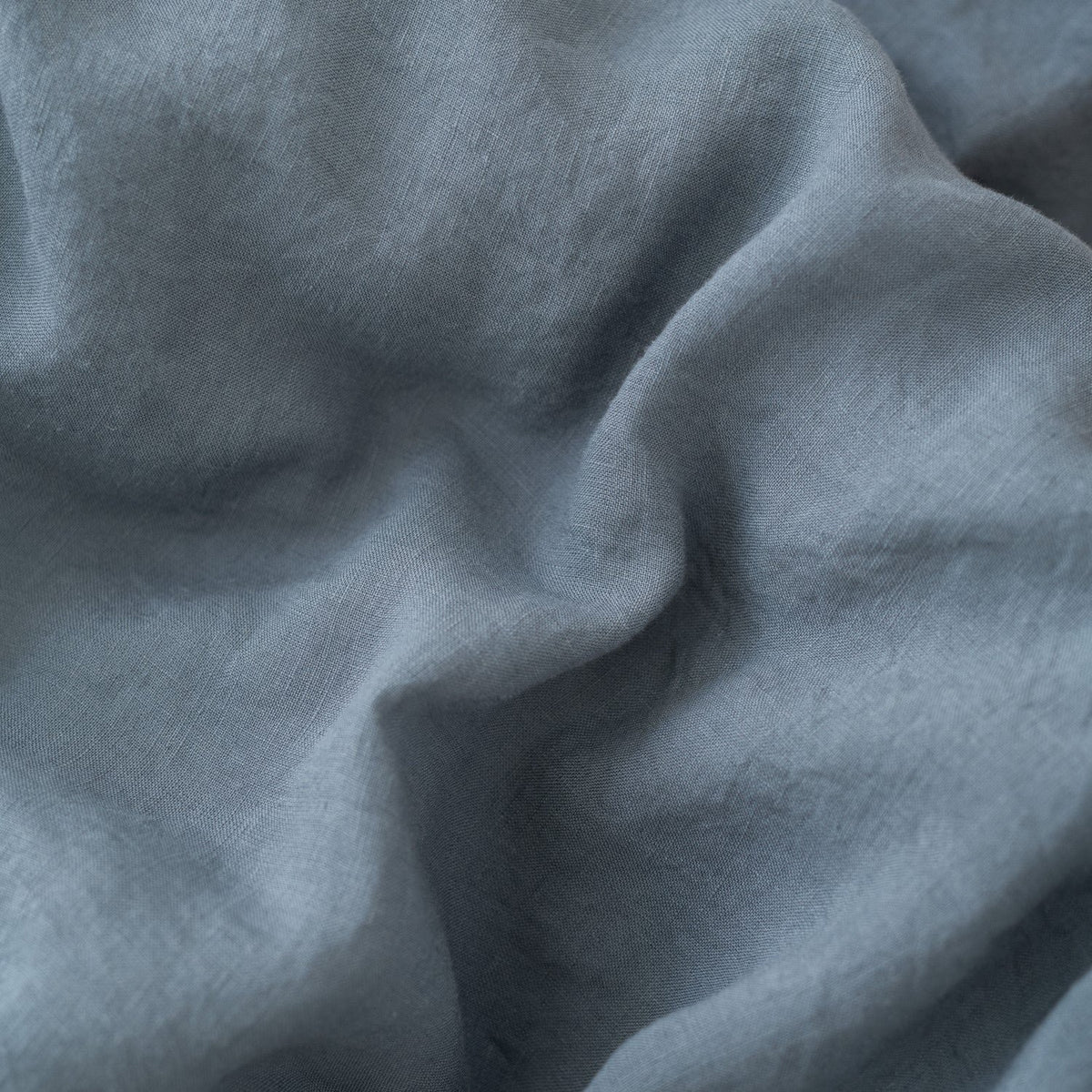 3. Close-up of blue fog linen fabric texture, showcasing softness and quality