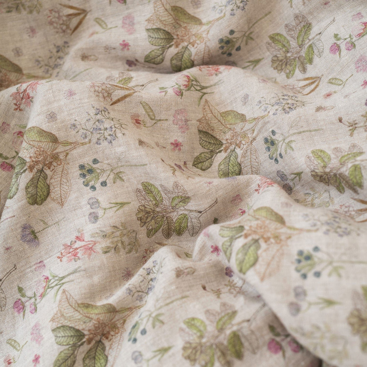 3. Close-up of botanical print on kids' linen duvet cover fabric, showing floral details