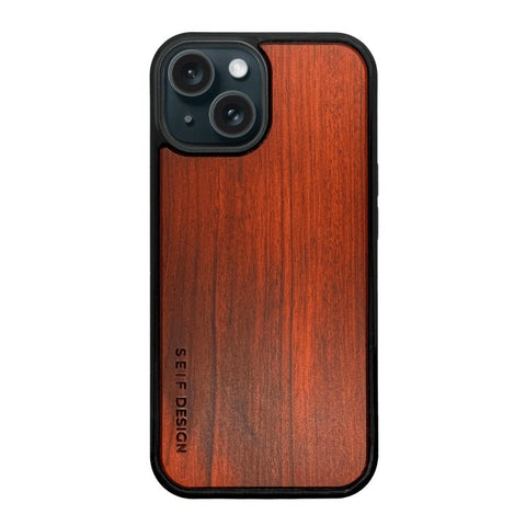 2. Cherry wood iPhone cover by Seif Design with precision cutouts, shown in studio lighting highlighting the natural wood grain and engraved brand logo