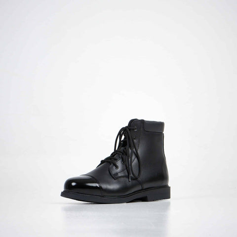 4. Unisex black leather ankle boots by Samelin, front angle view in studio
