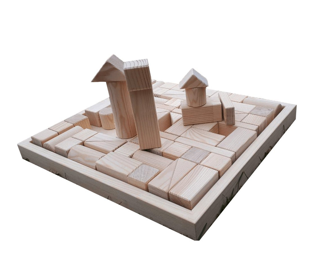 1. Hand-made wooden blocks set arranged in a creative structure on a wooden tray, showcasing various shapes and sizes made from pinewood
