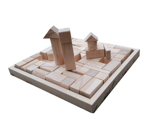 1. Hand-made wooden blocks set arranged in a creative structure on a wooden tray, showcasing various shapes and sizes made from pinewood