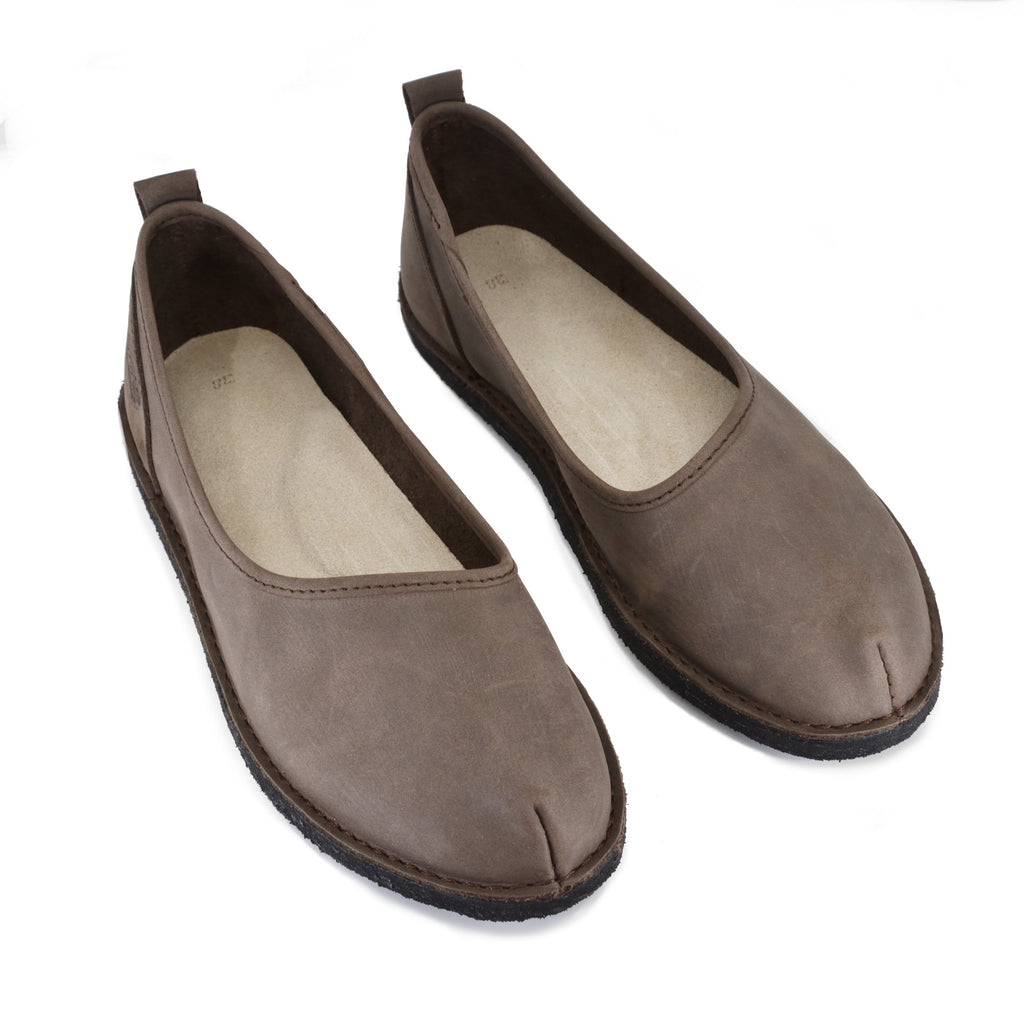 5. Studio shot of women's Kuutsid Shoes in dark brown by OmaKing, showing top view of both shoes