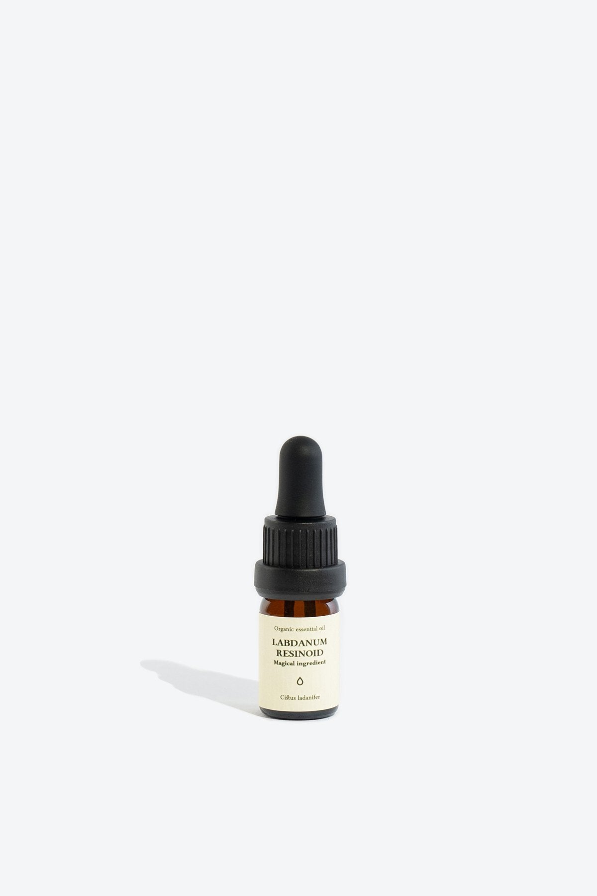 2. Smells Like Spells LABDANUM RESINOID Essential Oil bottle in studio setting