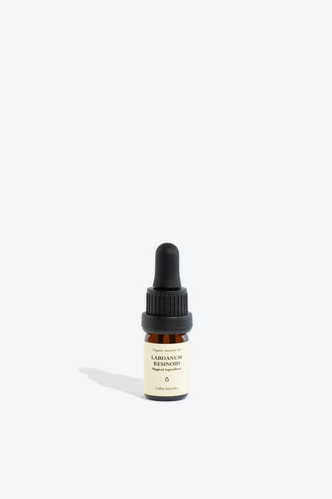 2. Smells Like Spells LABDANUM RESINOID Essential Oil bottle in studio setting