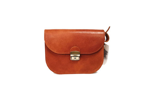 2. Zelma Kraft natural leather saddle bag in light brown with secure buckle closure, shown in studio