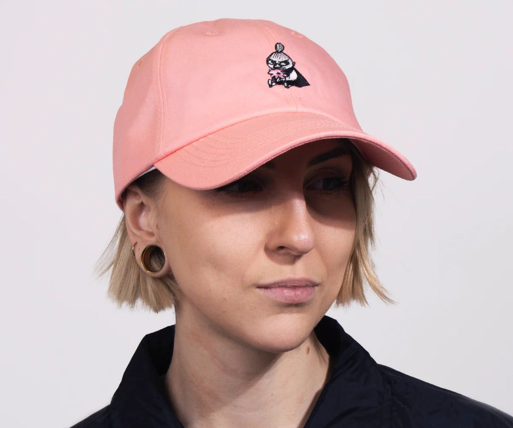 1. Women's pink Little My cap by Moomin, worn by model in studio setting