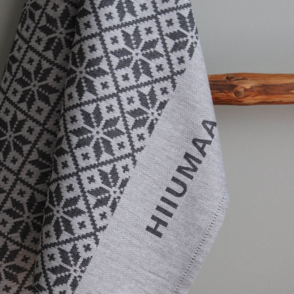 3. Close-up of grey kitchen towel showing Pühalepa pattern and Hiiumaa text detail