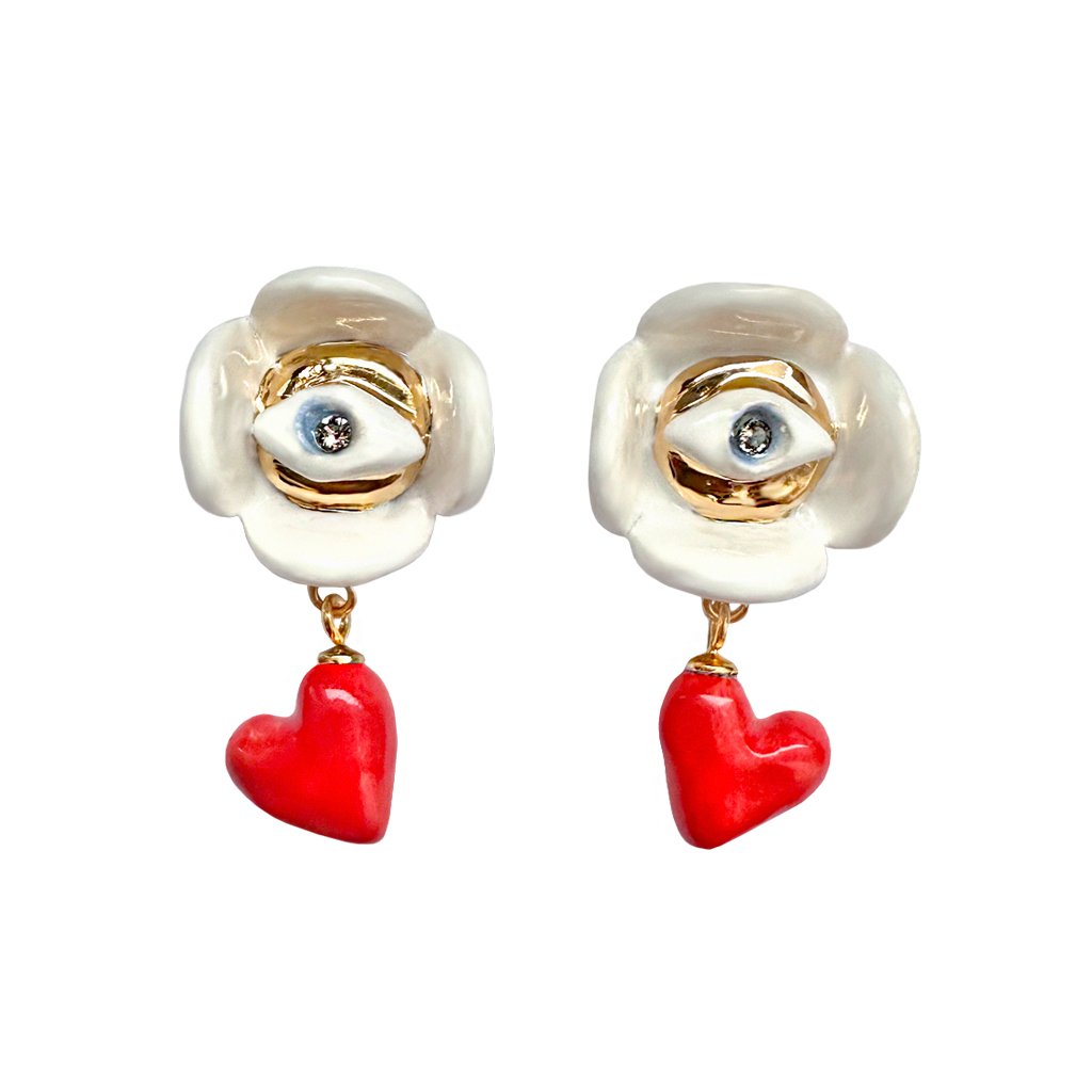 2. Studio image of SCULP Love Is… earrings with Eye of Protection charm, red heart dangles, and 24K gold accents