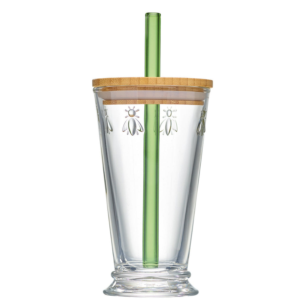 2. Transparent La Rochère Bee Smoothie Glass with bamboo lid and green glass straw, featuring embossed bee design, shown in studio setting