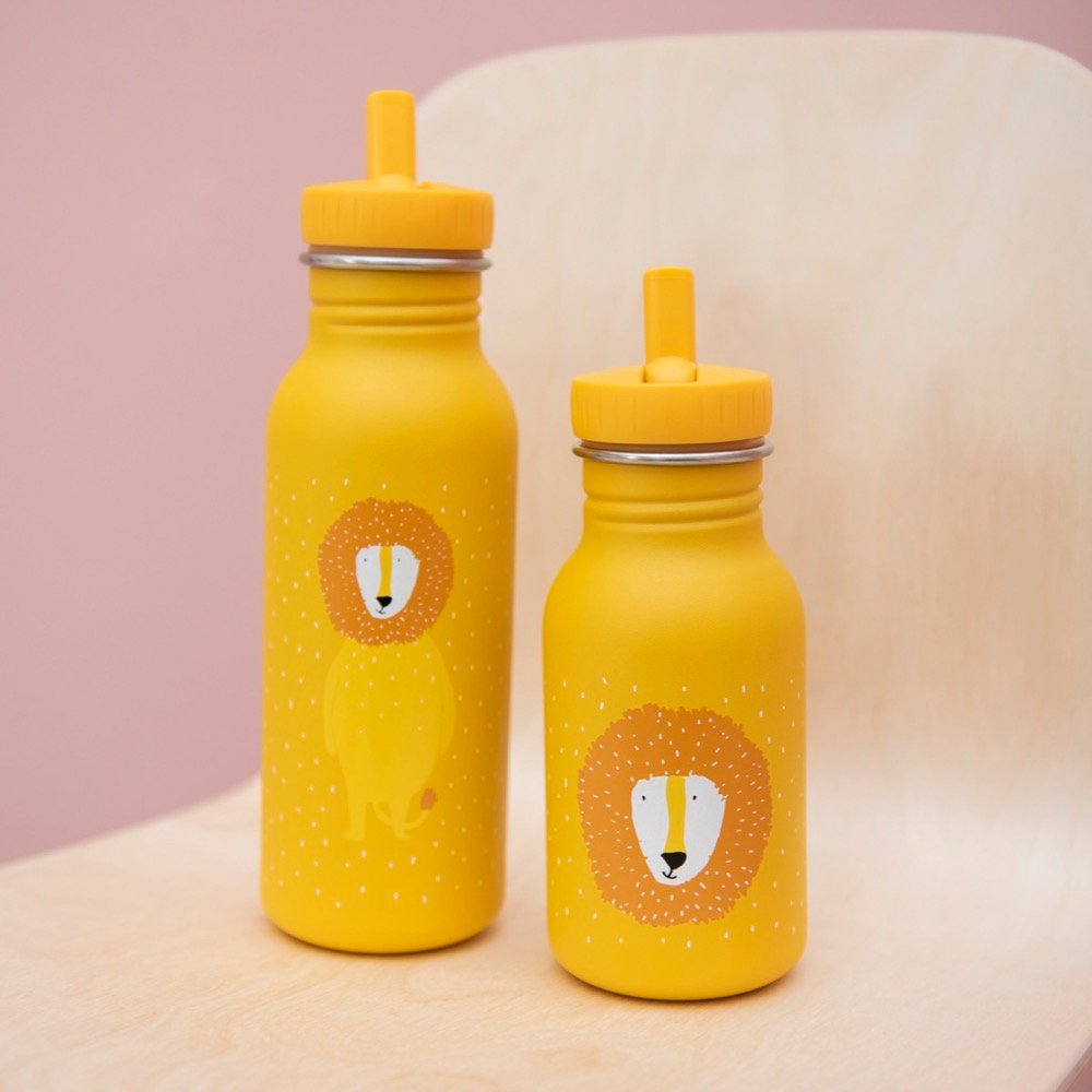 2. Two yellow stainless steel bottles with lion illustrations on wooden chair, showcasing different sizes