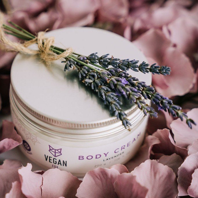 2. Vegan Fox Lavender Body Cream jar with lavender sprig on pink petals, highlighting natural ingredients
