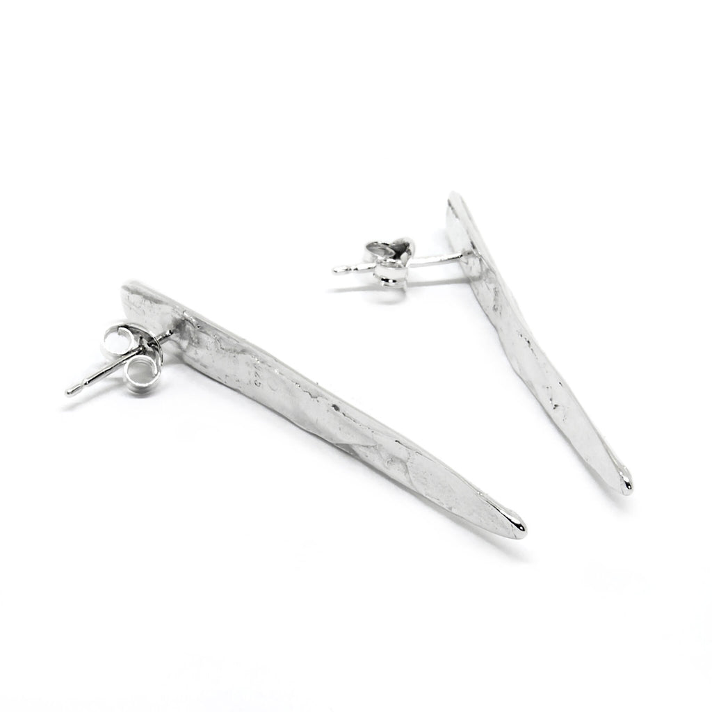 3. Side view of Agnes Veski Jewellery SPRING Leaf earrings in silver plating, highlighting lightweight design