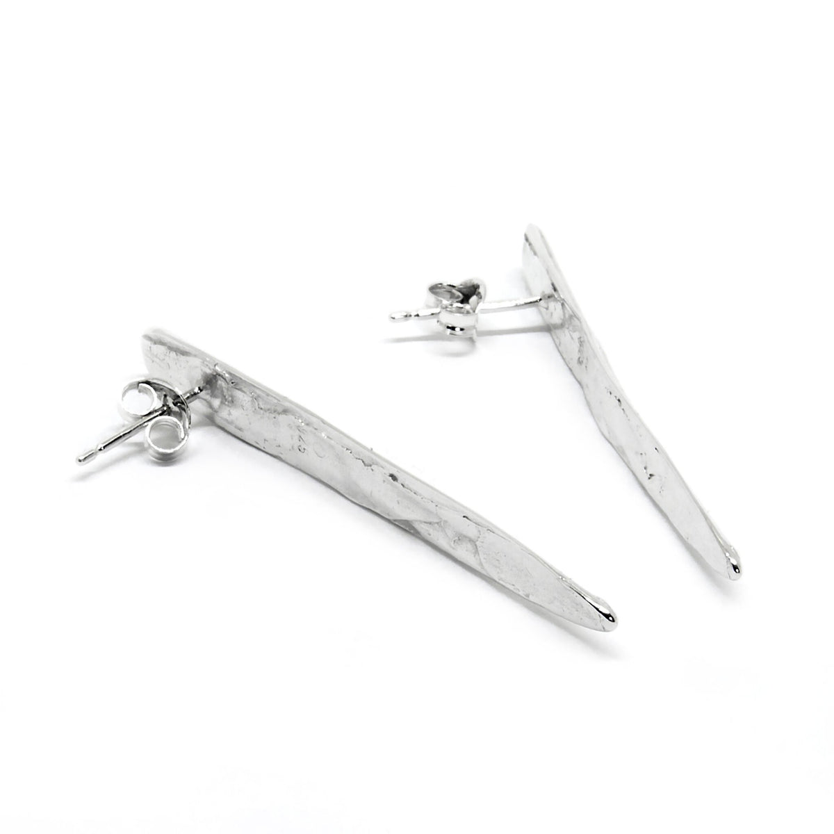 3. Side view of Agnes Veski Jewellery SPRING Leaf earrings in silver plating, highlighting lightweight design