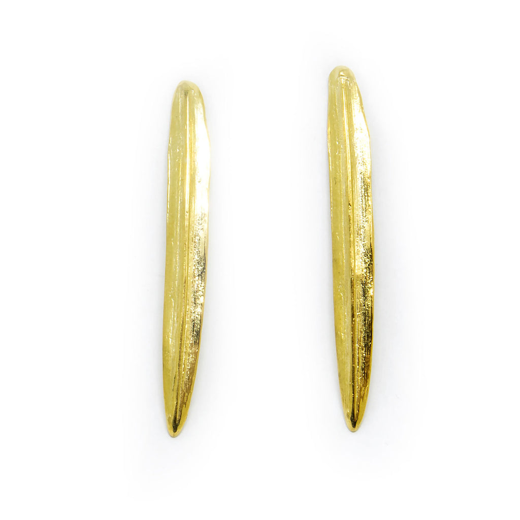 4. Agnes Veski Jewellery SPRING Leaf earrings in gold plating, shown in a studio setting