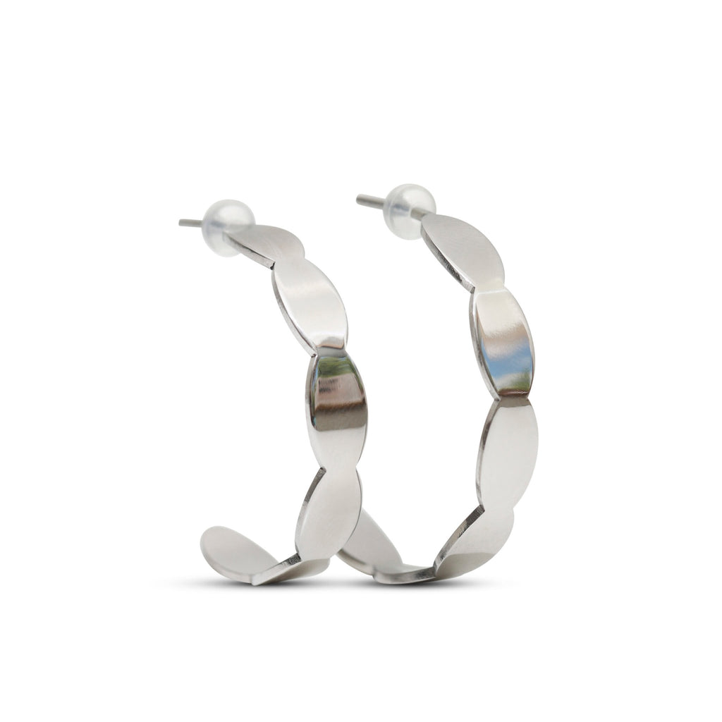 4. Studio shot of Lentsius Mare stainless steel earrings with silicone stoppers