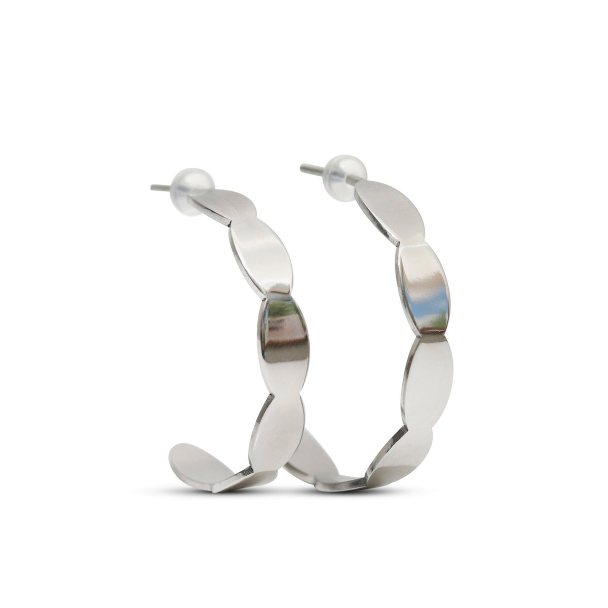 4. Studio shot of Lentsius Mare stainless steel earrings with silicone stoppers