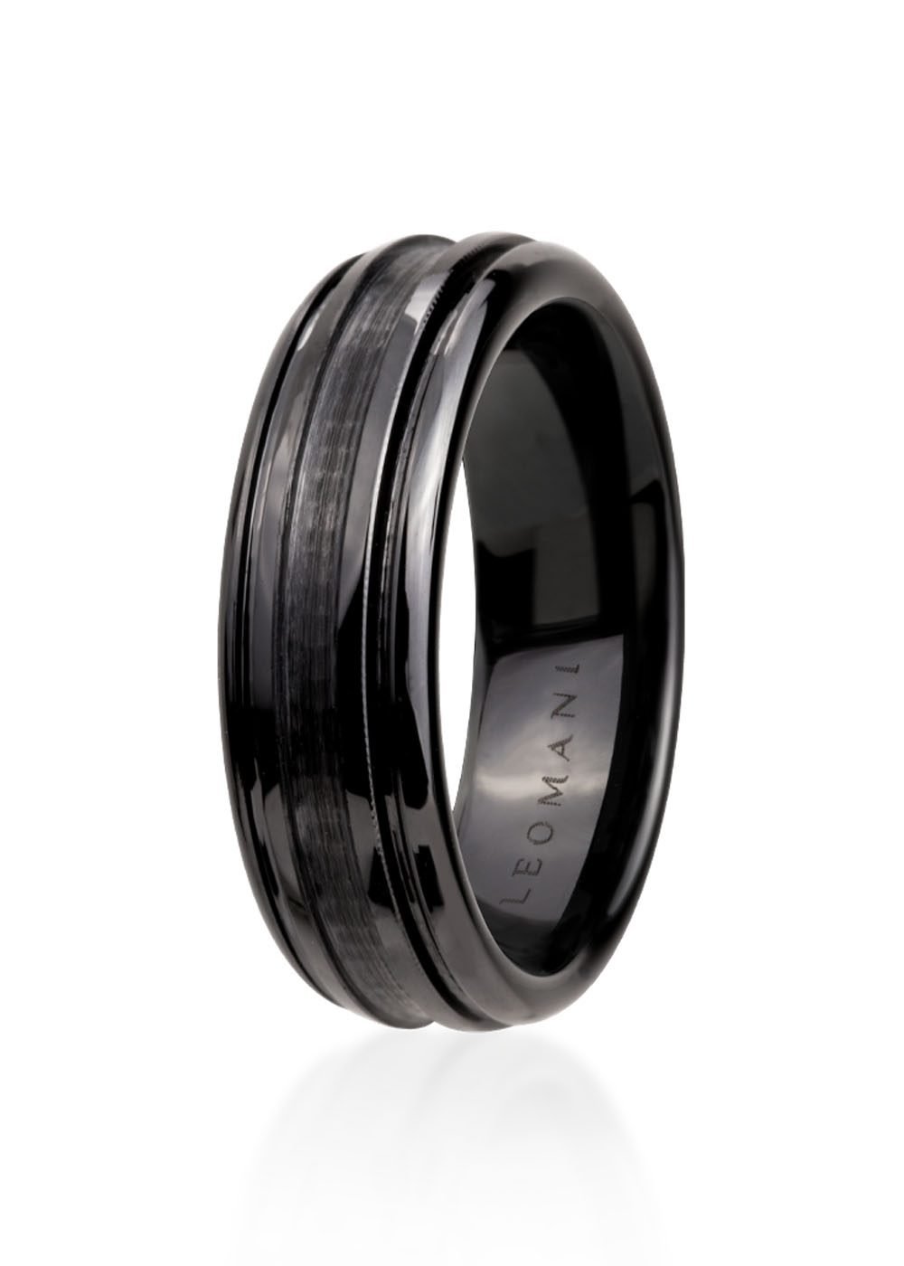 2. Men's black ceramic ring by Leomani with modern design, featuring a smooth finish and subtle grooves, shown in studio lighting highlighting its sleek and durable construction