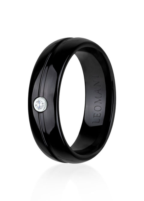 2. Men's ring by Leomani in black high-quality ceramics with rhodium plated 925 sterling silver and white zircon stone, shown in studio setting highlighting modern design and durability