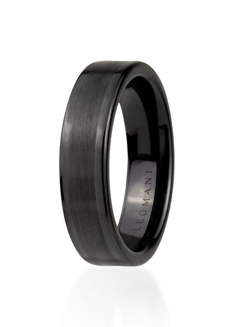 2. Men's black ceramic ring by Leomani with a smooth finish shown in studio lighting