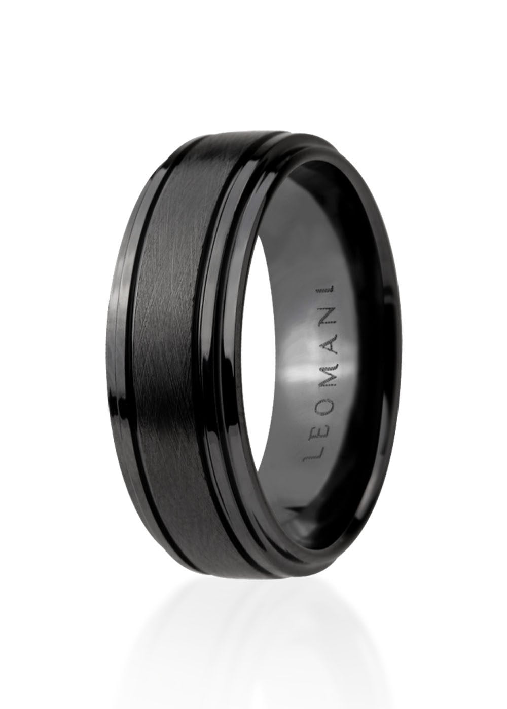 2. Men's black ceramic ring by Leomani with a sleek modern design, shown in studio lighting highlighting its smooth finish