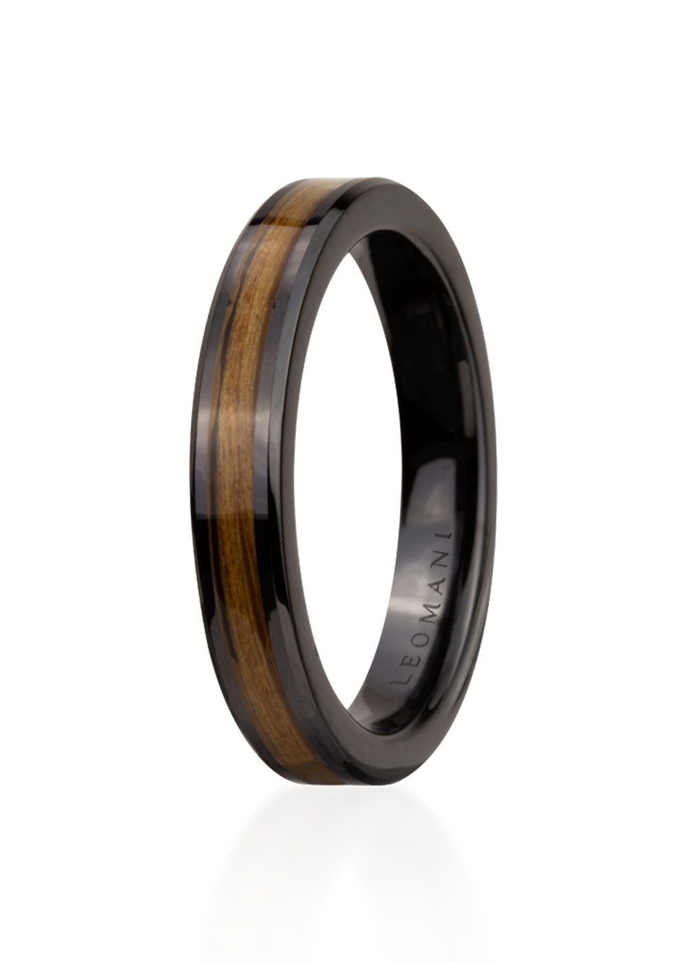 2. Men's black ceramic ring with wood veneer inlay by Leomani, shown in studio lighting highlighting sleek design