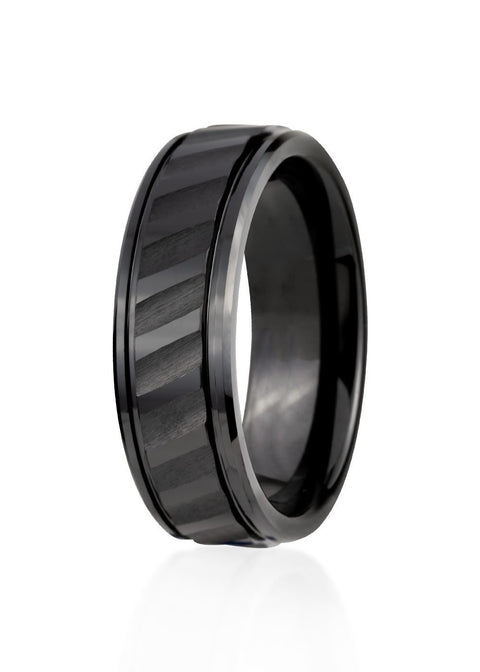 2. Men's black ceramic ring by Leomani with modern design and textured band, shown in studio lighting highlighting its sleek and durable finish