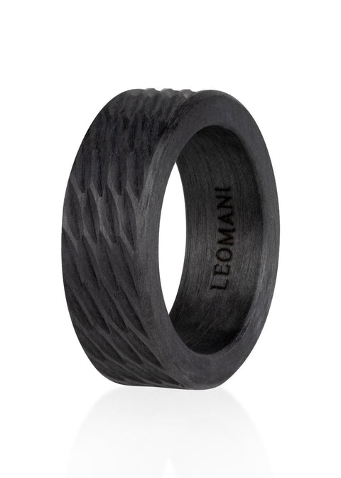 2. Men's carbon fiber ring by Leomani with textured design, shown in studio lighting highlighting its modern and durable style