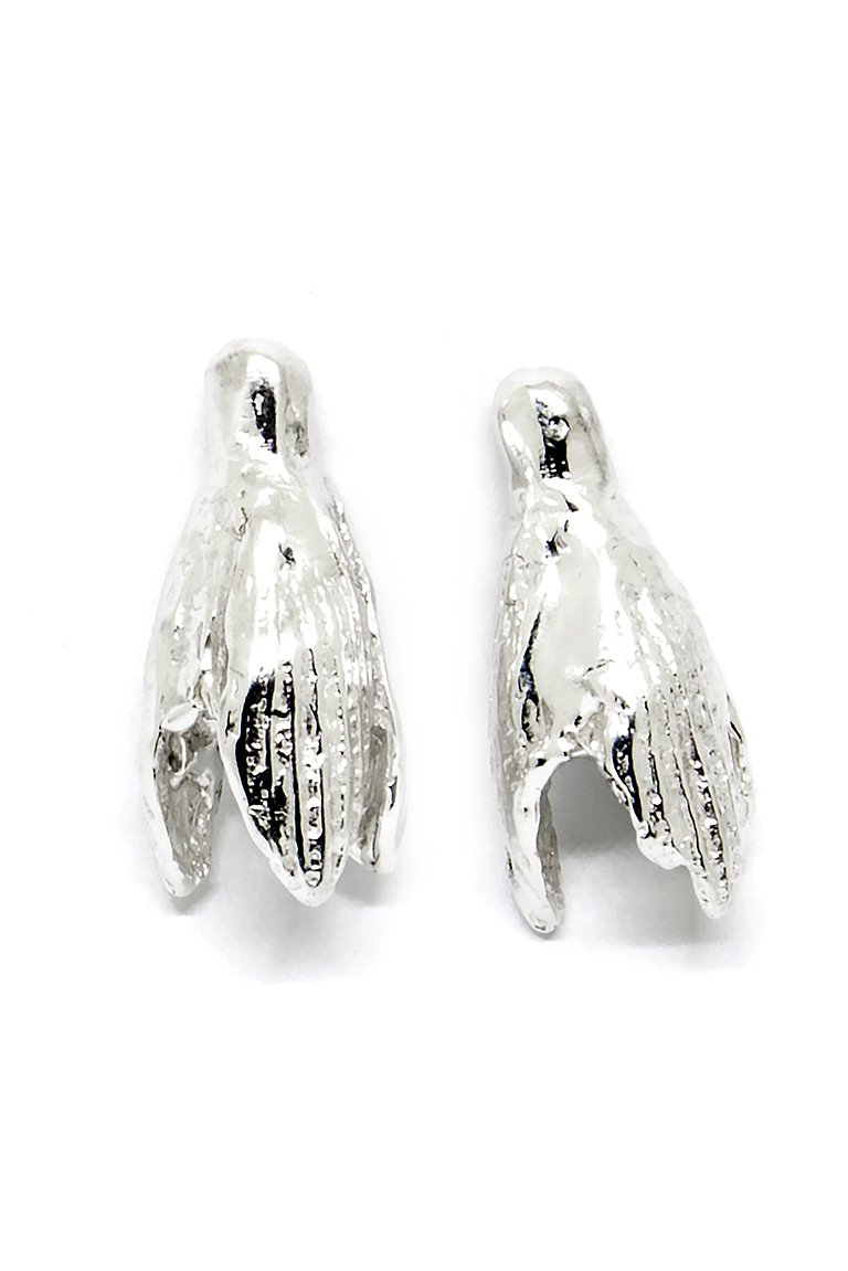 4. Flat lay of Agnes Veski Jewellery SPRING Snowdrops silver earrings, displaying unique Nordic-inspired design