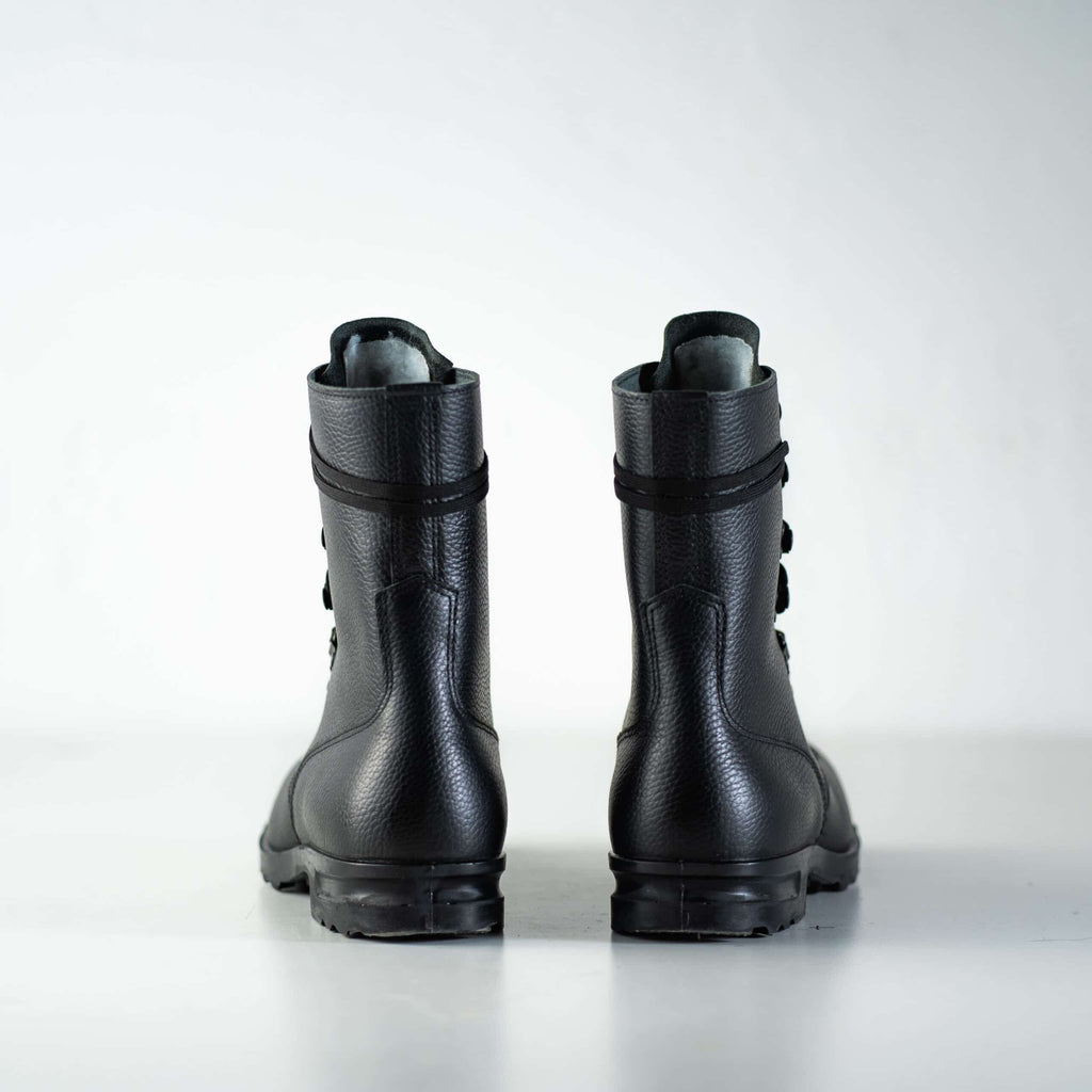 5. Back view of M77 Norwegian Combat Boots by Samelin in black leather, studio setting