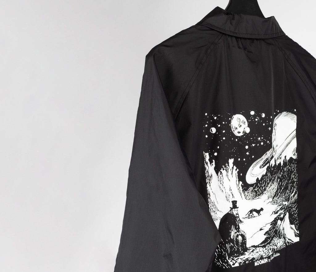 6. Studio shot of unisex black Coach Jacket The Hobgoblin by Moomin with back artwork