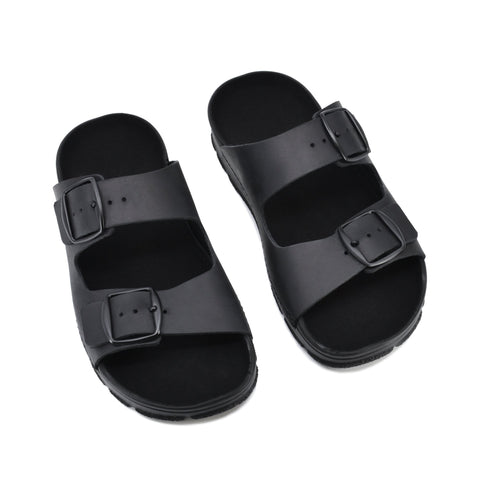 5. Top view of Meeliku black sandals by Omaking, highlighting natural leather and buckle design