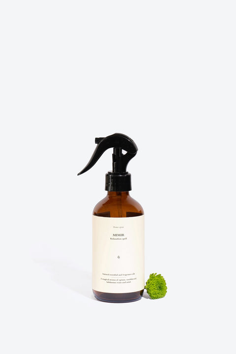 2. Smells Like Spells Perfumed Home Spray MIMIR with green flower accent, studio shot