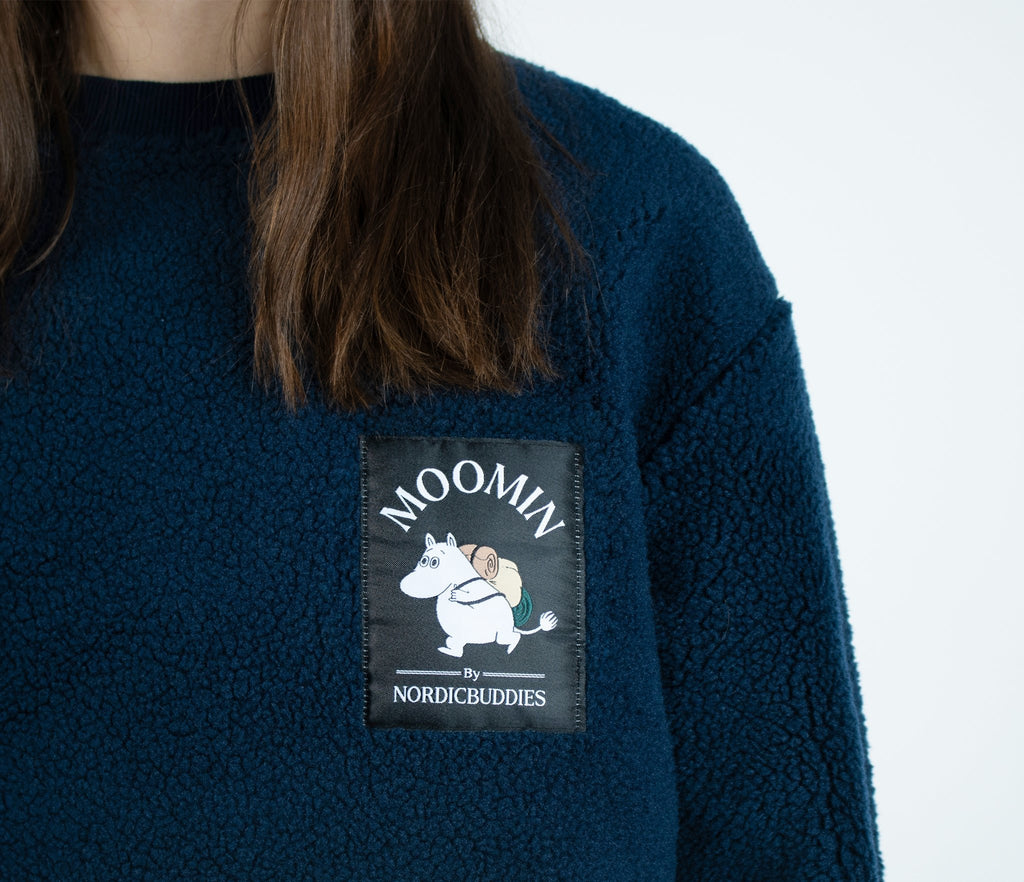 6. Close-up of Moomin by NordicBuddies logo on navy fleece