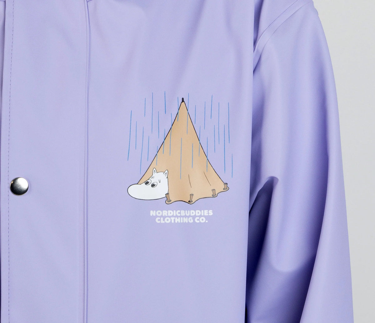 13. Close-up of front design on Moomin Adventure Rain Jacket in lilac with Moomin illustration