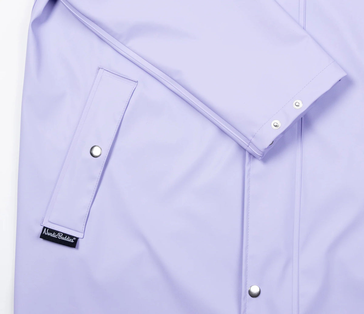 12. Close-up of sleeve and pocket details on Moomin Adventure Rain Jacket in lilac