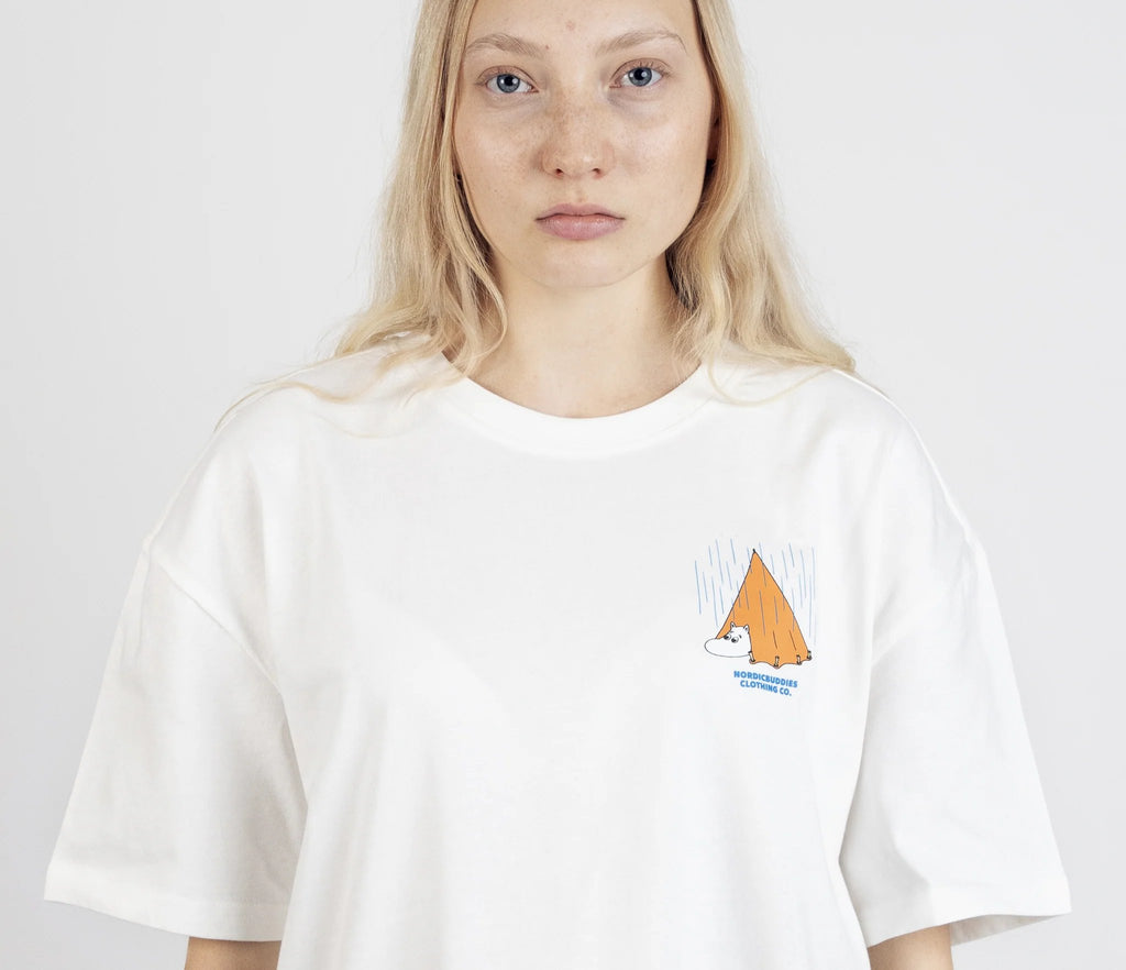2. Unisex white Moomin Adventure T-Shirt worn by female model, front view with small tent graphic on chest
