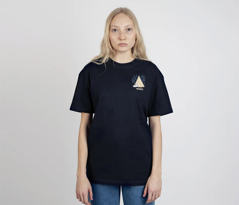 5. Female model wearing unisex navy Moomin Adventure T-Shirt by NordicBuddies, front view with tent design