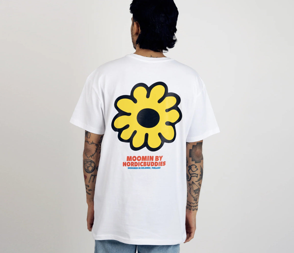 4. Men's Moomintroll's Flower T-Shirt by NordicBuddies, featuring large yellow flower graphic on back, shown in studio