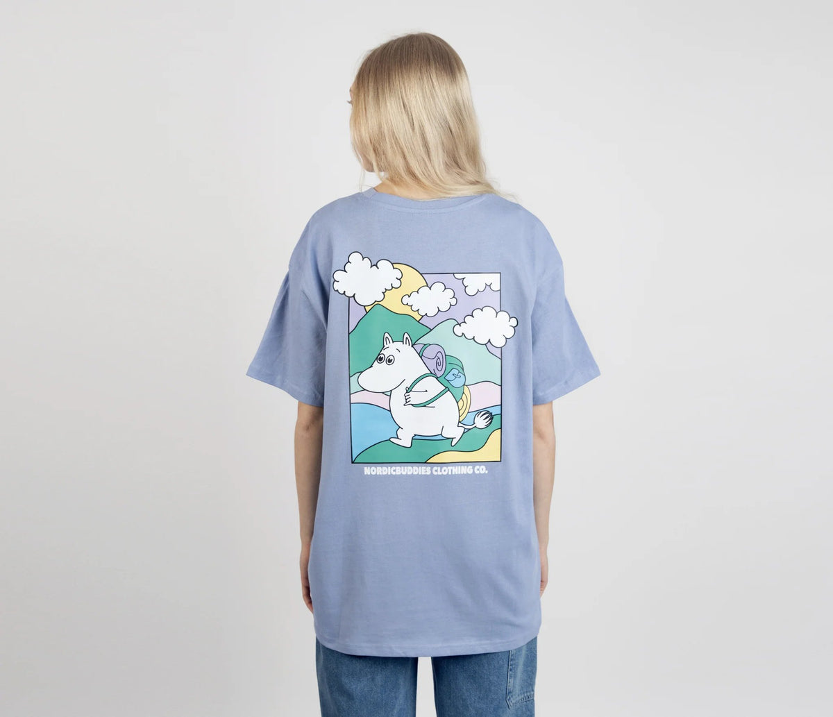 7. Women's unisex blue Moomintroll's Adventure T-shirt with Moomin graphic, shown from back in studio