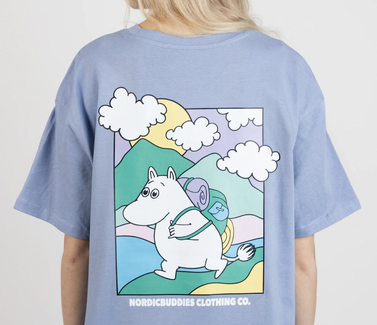 1. Women's unisex blue Moomintroll's Adventure T-shirt with colorful Moomin graphic on back, shown in studio