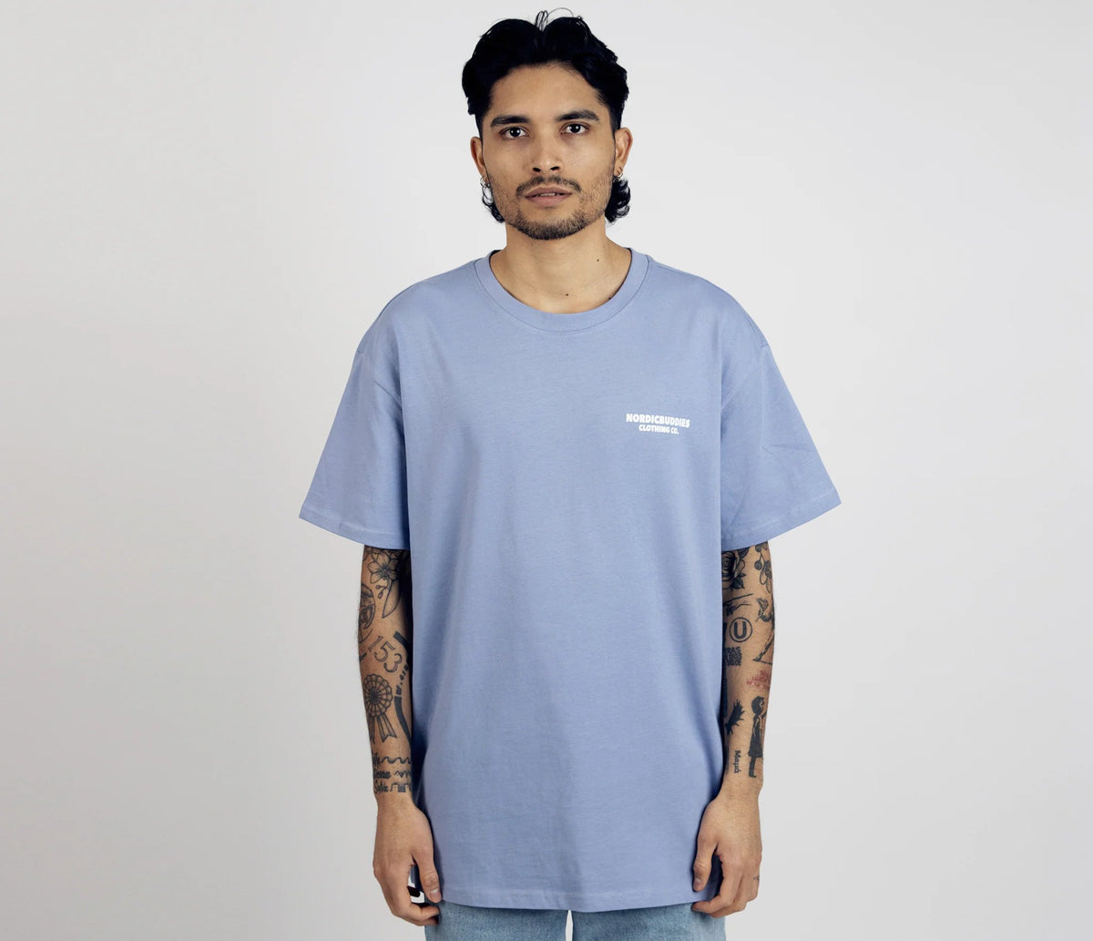 5. Men's unisex blue Moomintroll's Adventure T-shirt with NordicBuddies logo, shown from front in studio