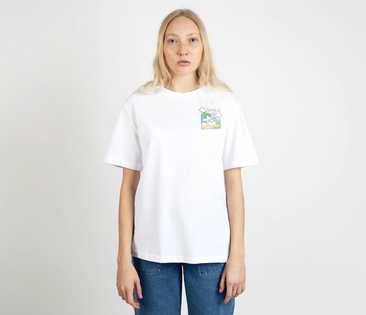 5. Female model wearing white Moomintroll's Adventure t-shirt by NordicBuddies, shown from the front