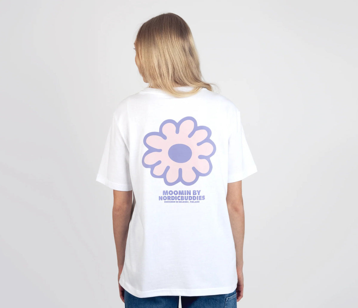 5. Women's white Moomintroll t-shirt by NordicBuddies, back view with flower design, worn by model