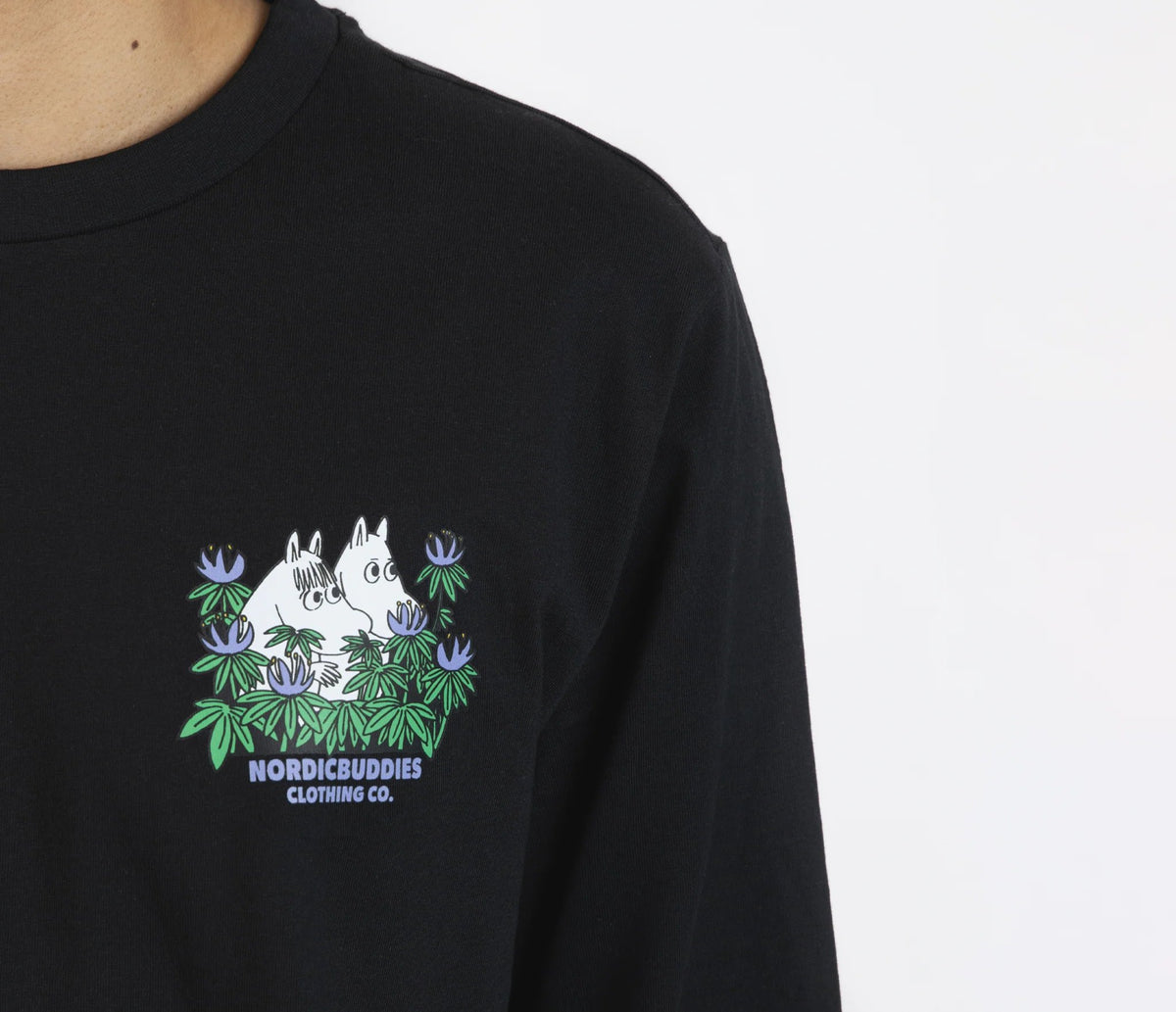 1. Close-up of Moomin by NordicBuddies black longsleeve shirt with cuffrib, featuring playful Moomin graphic on chest