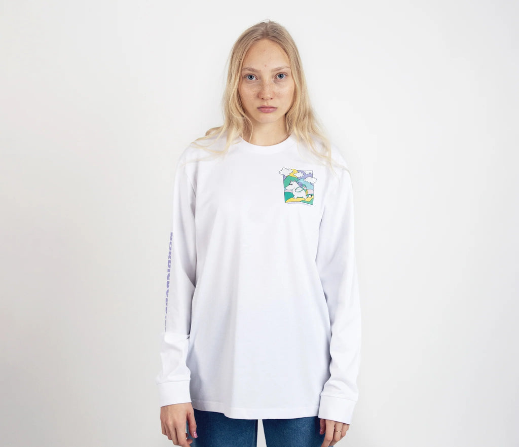 1. Unisex white Moomintroll's Adventure longsleeve shirt worn by female model, featuring colorful chest graphic and NordicBuddies branding on sleeve