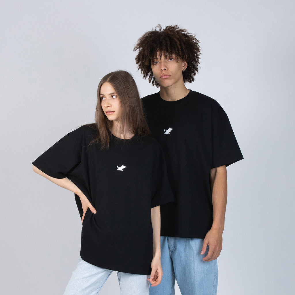1. Unisex black Moomin Classics heavy t-shirt worn by male and female models in studio