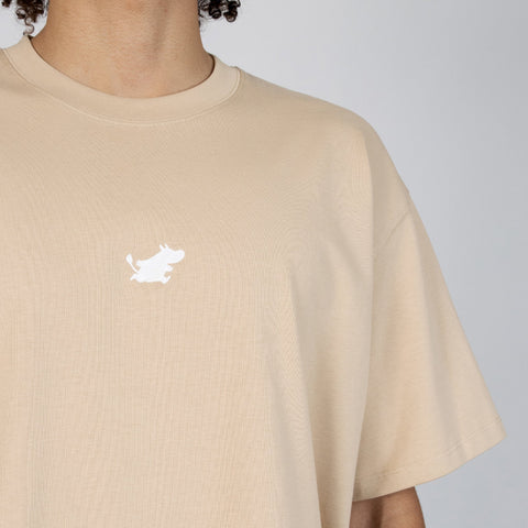 5. Close-up of Moomin logo on beige cotton fabric of heavy t-shirt