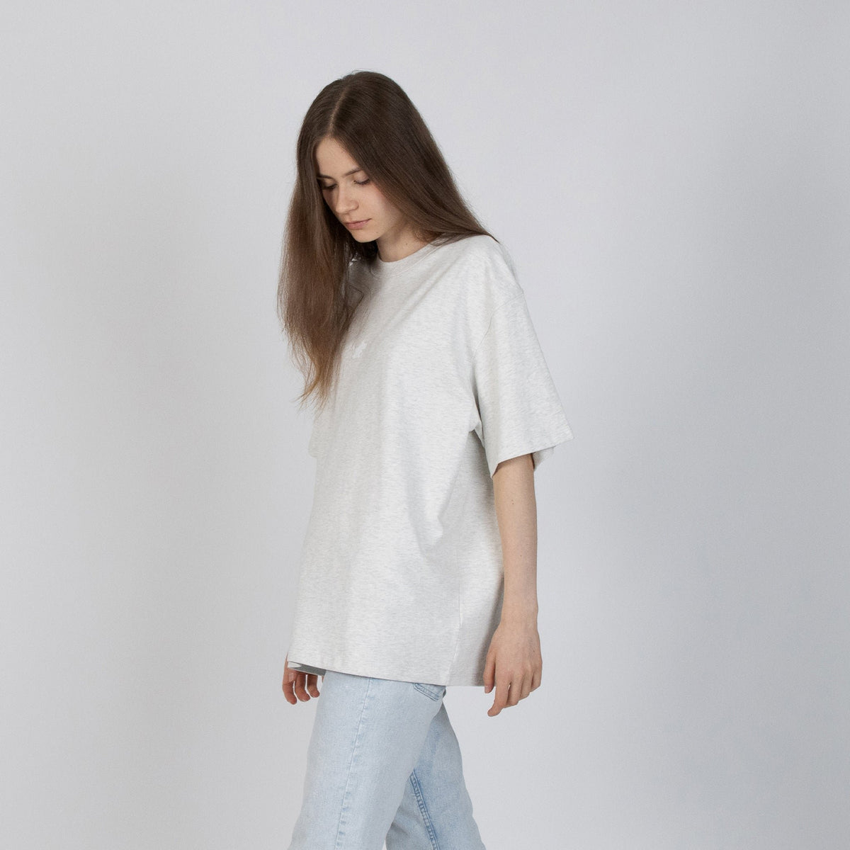 3. Unisex Moomin Classics heavy T-shirt in melange grey worn by female model in studio