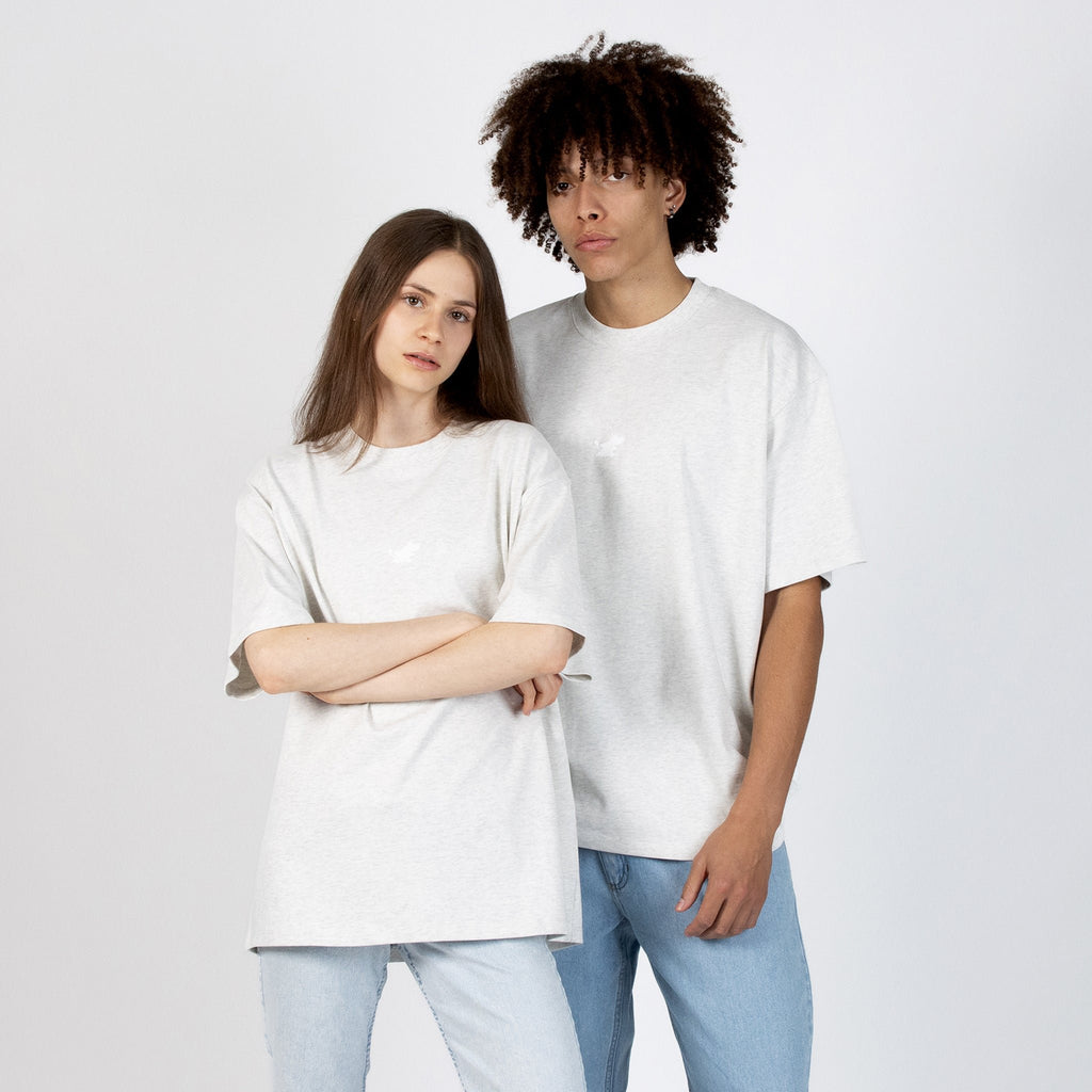 1. Unisex Moomin Classics heavy T-shirt in melange grey worn by male and female models in studio